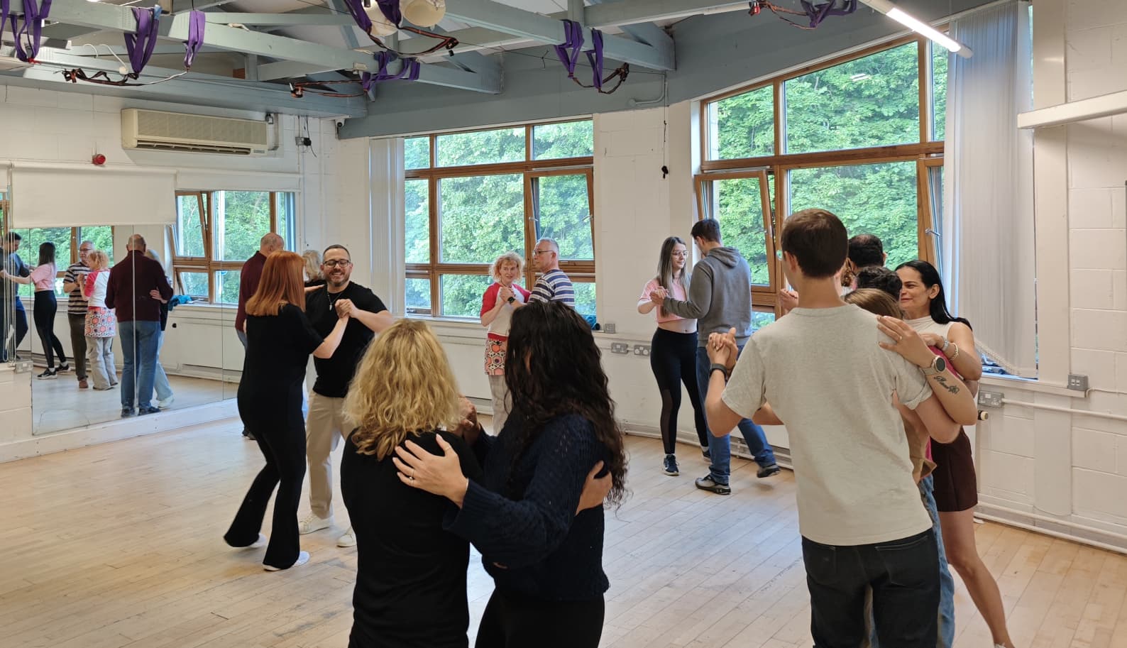 Students social dancing at a Bailarte class in Edinburgh
